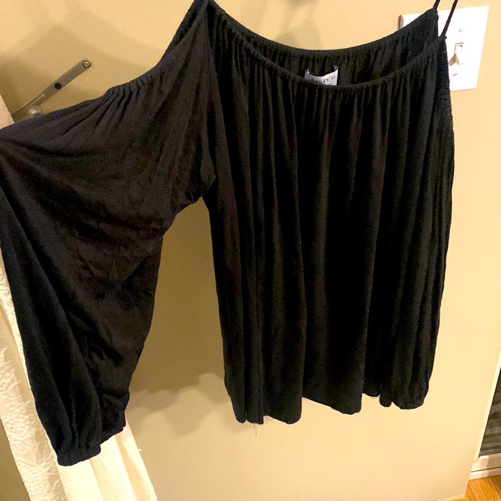 Black blouse with sleeve cut out